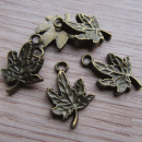 Bedeltje brons blaadje 