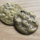 Bedel brons rond met tekst love