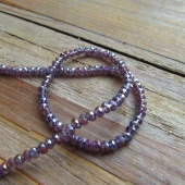 Streng facet rondellen transparant donkerpaars ABglans