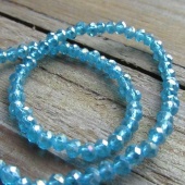 Streng facet rondellen transparant aqua ABglans