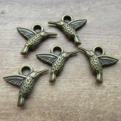 Bedeltje brons vogeltje vintage look