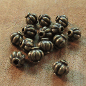 Geribbeld kraaltje brons