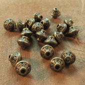 Versierde bicone brons metaal kraal