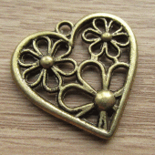 Bedel open hart vintage brons met bloemen