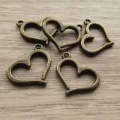 Bedeltje hartje vintage brons