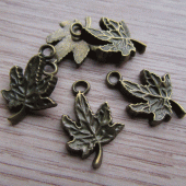 Bedeltje brons blaadje 