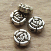Metalen kraal roosje