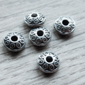 Metalen rondellen bewerkt