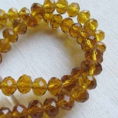 Streng facet rondellen transparant goudbruin