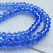 Streng facet rondellen transparant blauw