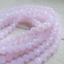 Streng facet rondellen imitatie jade bleekroze