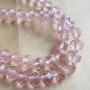 Streng facet rondellen transparant zachtroze 